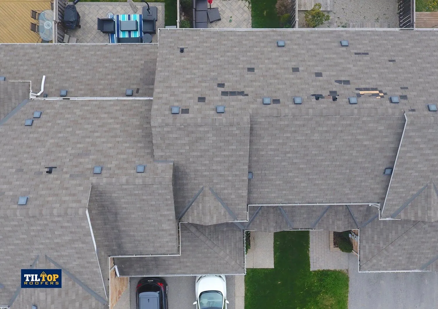 missing shingles black spots roof hole